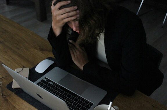 Woman frustrated at computer